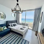 Blue Shades By The Coast