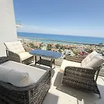Blue Shades By The Coast
