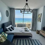 Blue Shades By The Coast